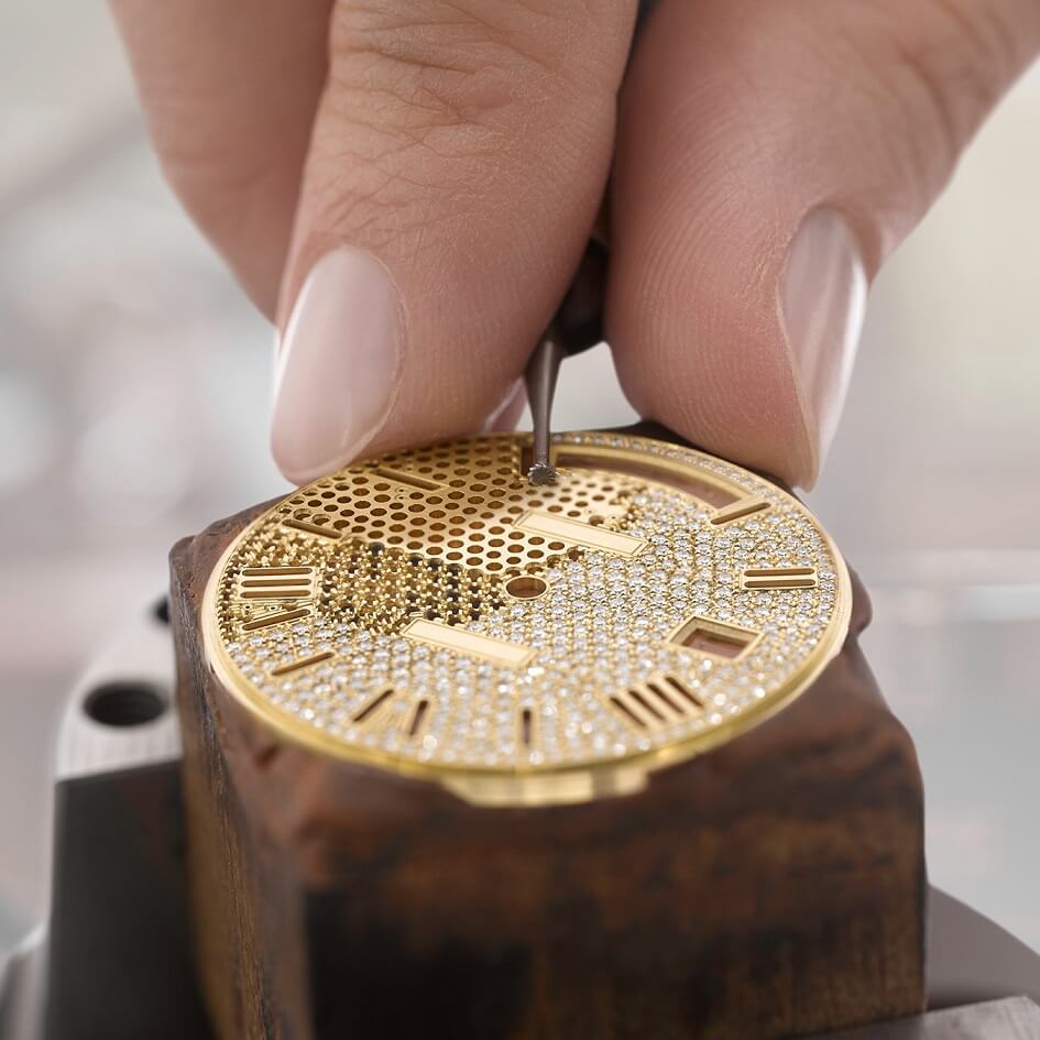 Detail of a stone-set dial on a luxury clone timepiece