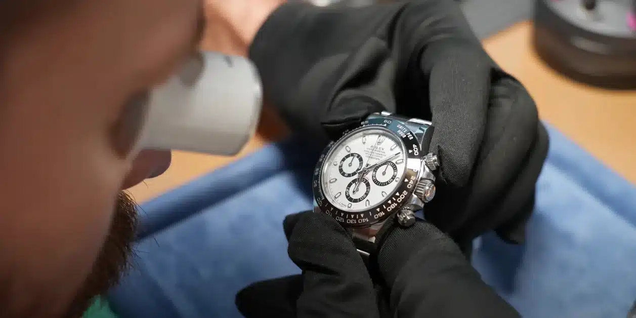 Master inspection of a super clone watch